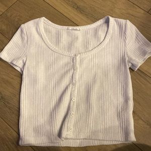 Cropped white t-shirt with buttons down the middle